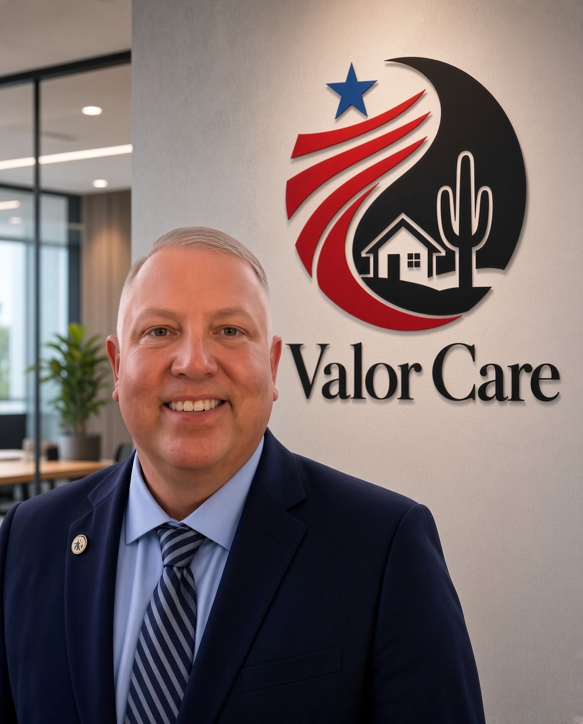 Joe, retired Navy veteran and VA liaison for Valor Senior Care, wearing a navy jacket and striped tie